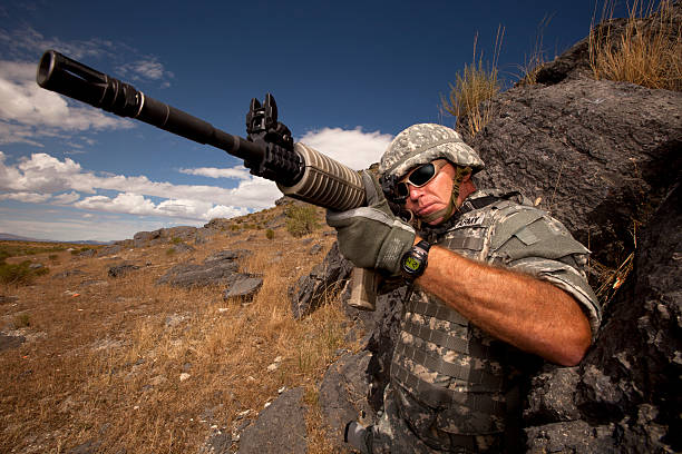 istock Special ops military soldier shooting an assault rifle 157638478