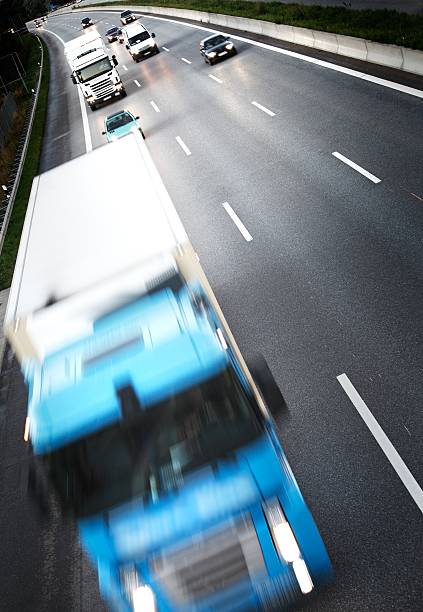 Twillight on the freeway - Trucks on Highway