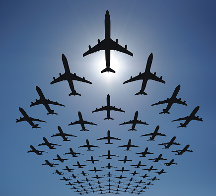Rows of many planes flying in the sky. Clear blue sky, shot against the sun. Check out some other aviation files:
[url=http://www.istockphoto.com/file_search.php?action=file&lightboxID=8986312]
[img]http://georgo.hu/stockphoto/in-the-sky-lightbox.jpg[/img][/url]
[url=http://www.istockphoto.com/file_search.php?action=file&lightboxID=3394147]
[img]http://georgo.hu/stockphoto/chartpromobusiness.jpg[/img][/url]