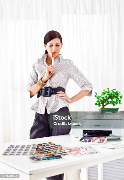 Young Woman Photo Editor At Work Stock Photo - Download Image Now - Computer Printer, Newspaper, Paper