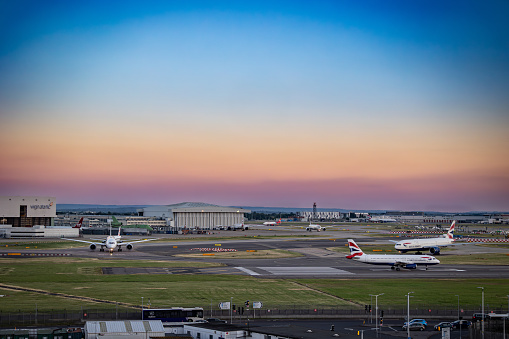 London, United Kingdom - June 22 2023: Airplanes are taxing in preparation for taking off from Heathrow Airport runway