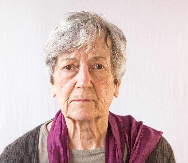 istock Senior Woman Looking at Camera 157638841
