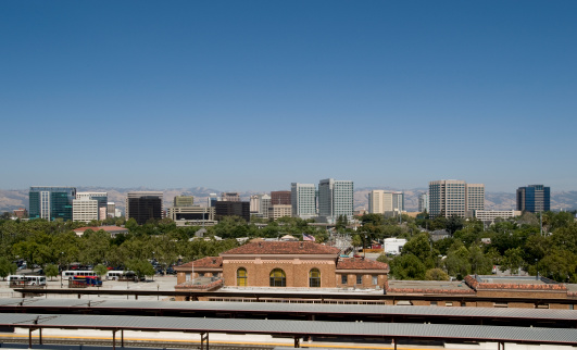San Jose, CA skyline. Day shot with train station in foreground.