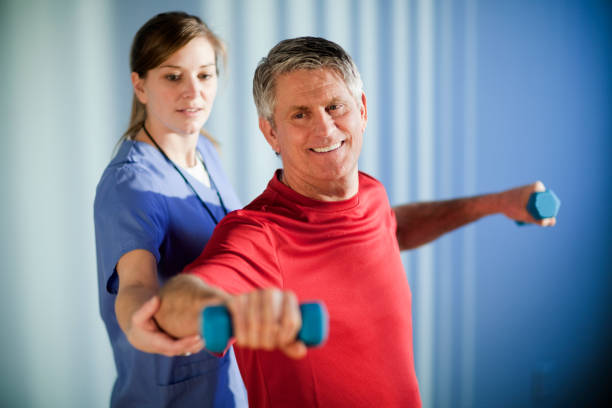 istock Mature man Working With a Physical Therapist 157638969
