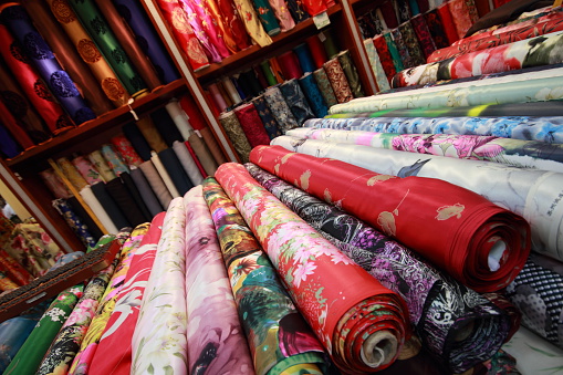 Silk rolls in a chinese shop, colorfull designs