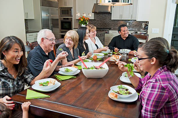 istock Family eating dinner together at someone's home 157639875