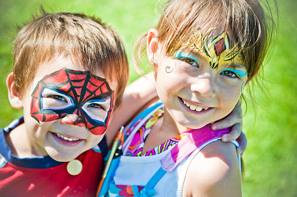 volto dipinto bambini - face paint child animal little boys foto e immagini stock