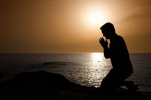 istock Silhouette of a man at sunset. 157639928