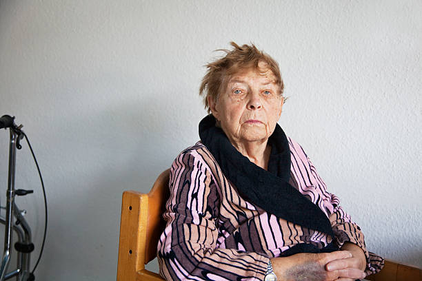 istock senior woman in hospital 157640101