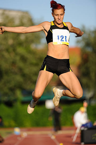 istock Female athlete at long jump 157640210