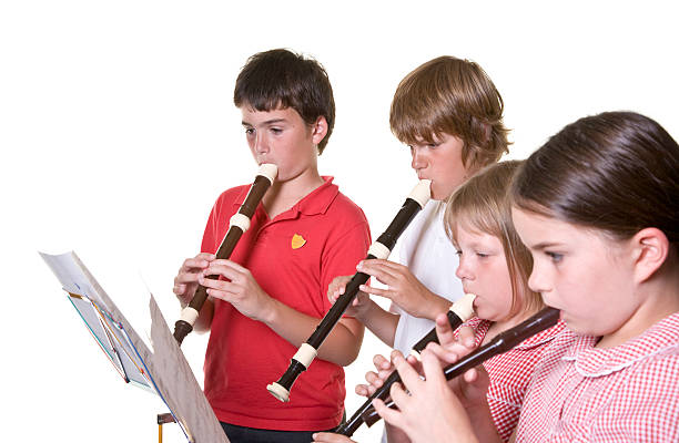 young caucasian man play music on his didgeridoo (Australian national musical instrument)