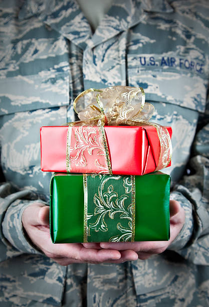 istock US Soldier with Christmas Gifts 157640348