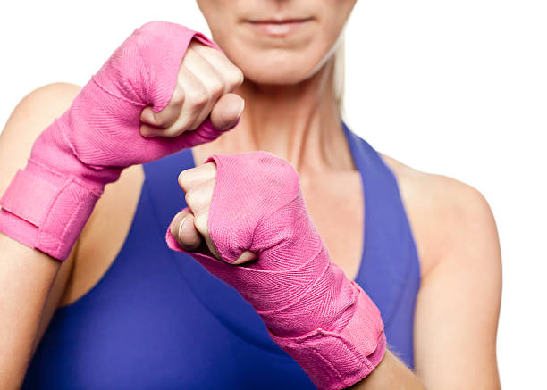 Fighting for Breast Cancer Awareness http://i152.photobucket.com/albums/s173/ranplett/cancer.jpg women boxing sport exercising stock pictures, royalty-free photos & images