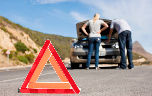 istock Hazard Sign For Couple with Car Trouble 157640984