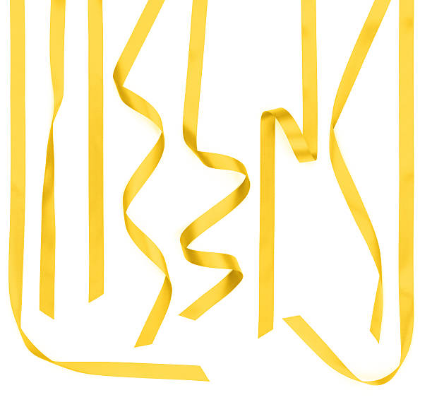 recto amarelo laço de fita de cetim chicória tiras, isolado a branco - curled up ribbon isolated on white photography imagens e fotografias de stock