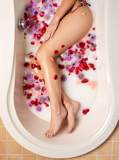 istock Beautiful legs in milk bath 157641215