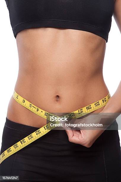 Foto de Bela Mulher Medindo A Altura Da Cintura e mais fotos de stock de Balança - Balança, Esporte, Forma