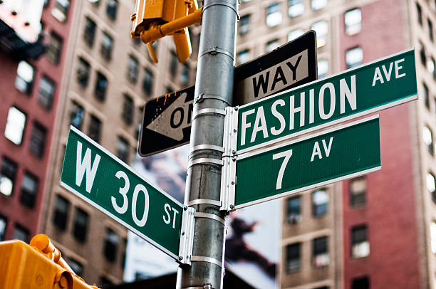 Fashion Avenue Fashion Avenue Street Sign in New York City road sign photos stock pictures, royalty-free photos & images