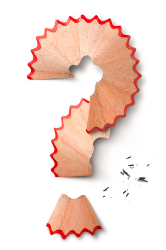Question mark made with pencil shavings. Photography in high resolution. 