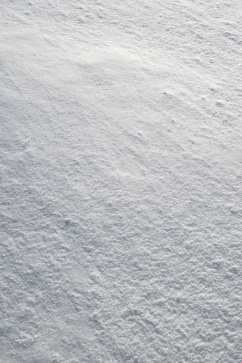 Winter snow. Snowy white texture. Snowflakes.