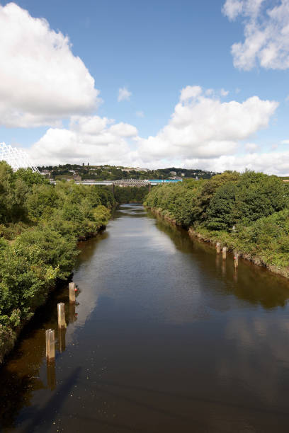 Train crossing River Tawe viaduct at Swansea