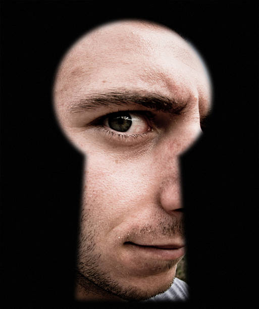 istock Discover something through lock door keyhole - Curious Man 157641728
