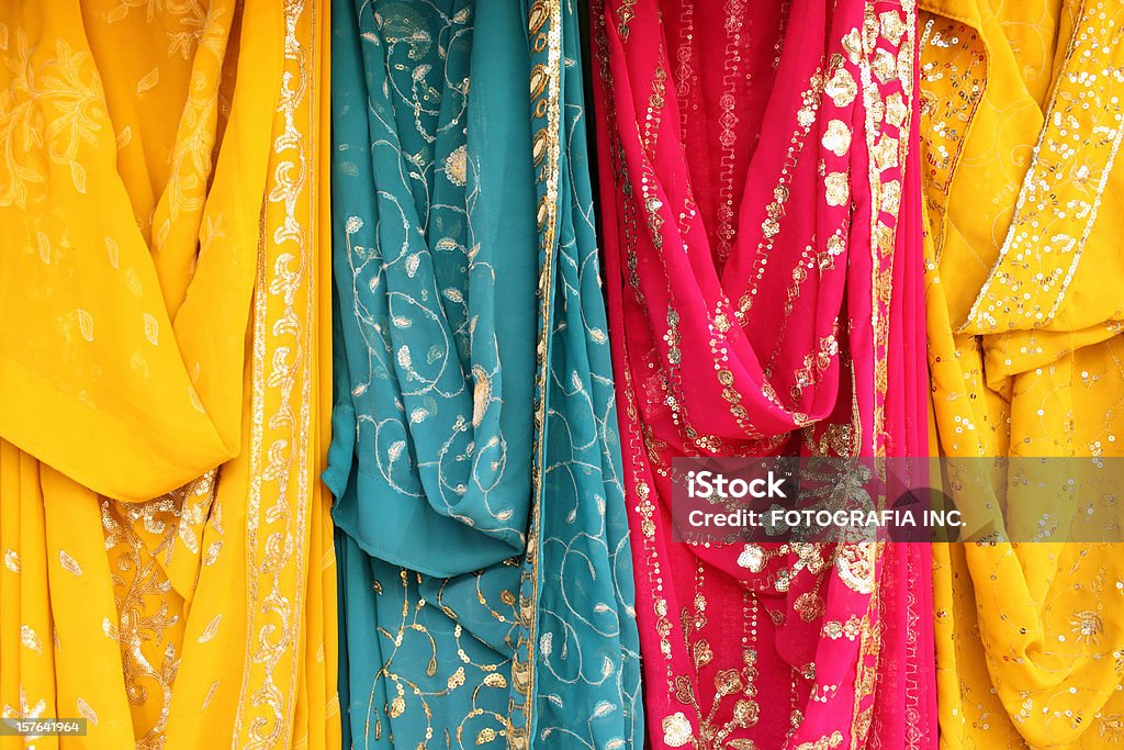 Sari Variety Selection of colorful saris on Indian outdoor market. Culture of India Stock Photo