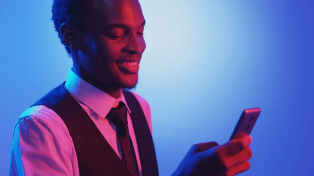 istock Mobile chat gadget people neon business man phone 1576422238