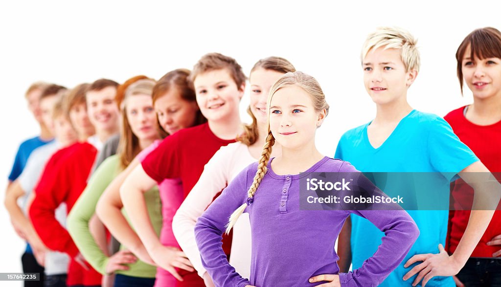 Smiling teenagers with hands on arms akimbo  Dancing Stock Photo