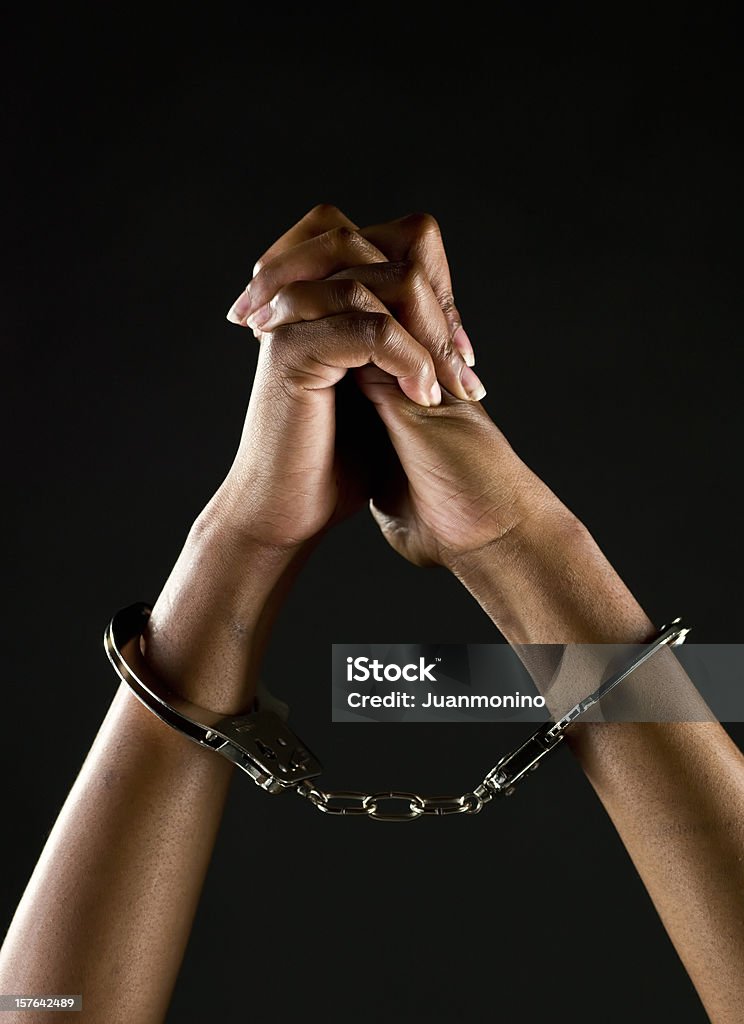 Handcuffed Hände - Lizenzfrei Handschelle Stock-Foto