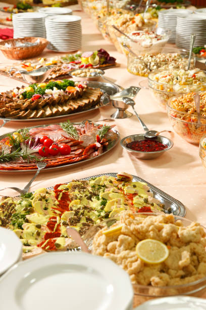 Catering table full of appetizing foods