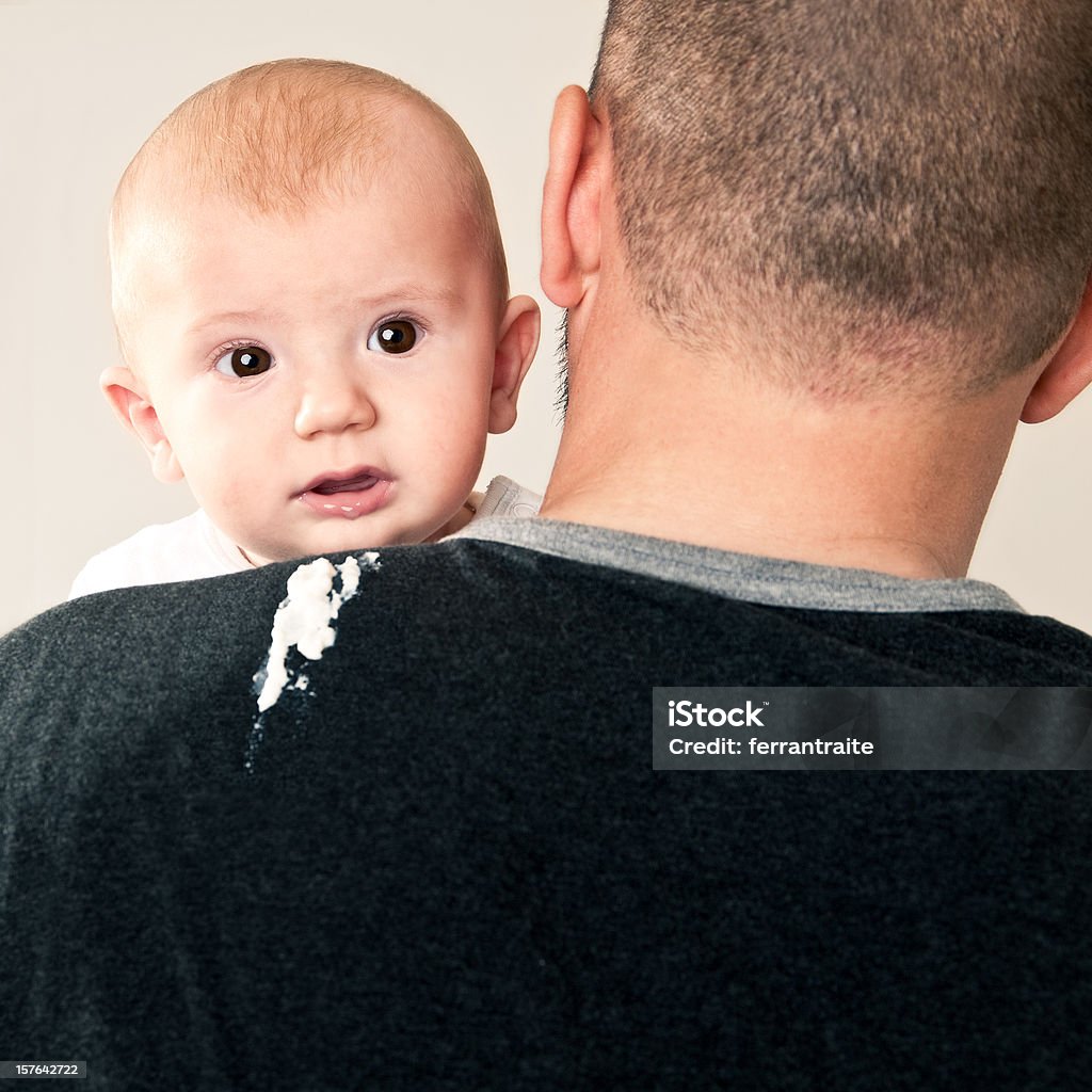 Baby Burp Father making his baby burp after feeding. Baby - Human Age Stock Photo