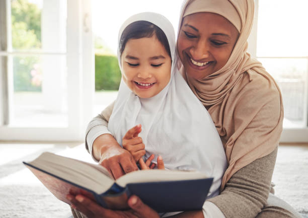 Quran, Muslim child or happy grandmother reading for learning, Islamic knowledge and hope in Allah, god or culture. Religion book, home or senior Arab woman teaching kid worship, respect or gratitude Quran, Muslim child or happy grandmother reading for learning, Islamic knowledge and hope in Allah, god or culture. Religion book, home or senior Arab woman teaching kid worship, respect or gratitude middle eastern ethnicity mature adult book reading stock pictures, royalty-free photos & images