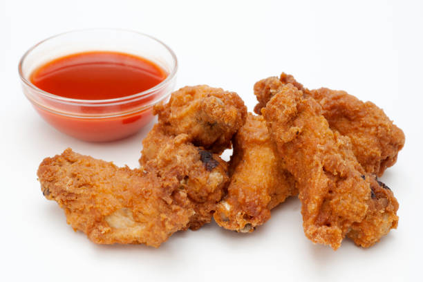 istock chicken buffalo wings and hot sauce 157643003