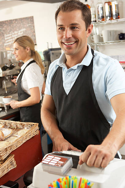 istock Café Staff Serving In Coffee Shop 157643030