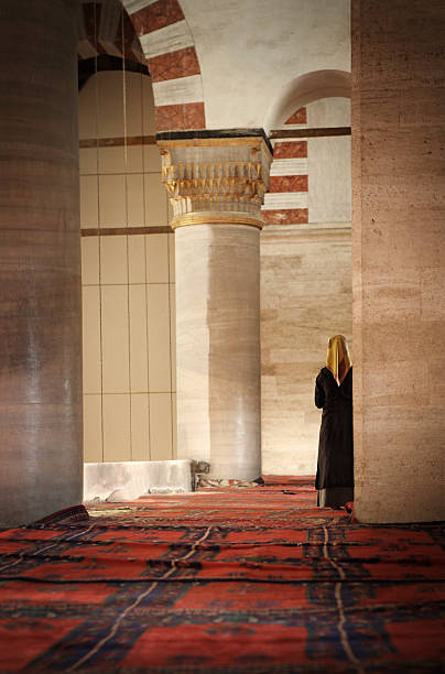 istock Woman in the Mosque 157643070