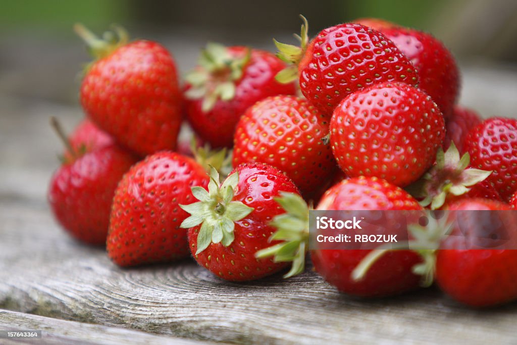 Tumble of Strawberries Camera: Canon Strawberry Stock Photo