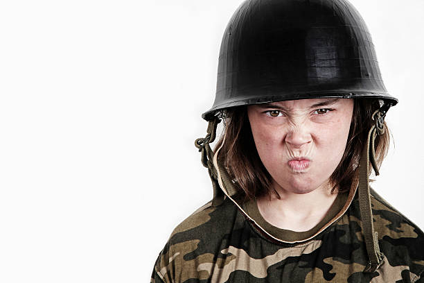 istock little soldier girl with attitude 157643523