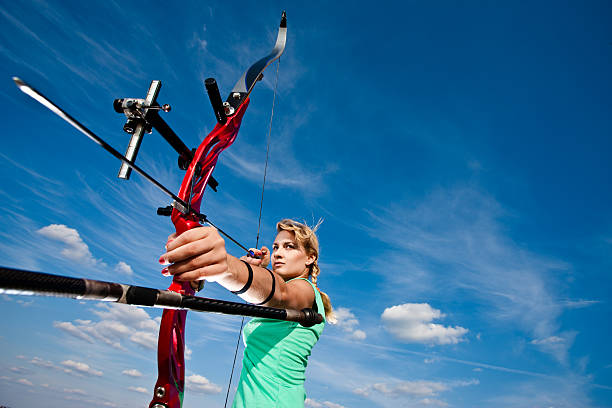archer mädchen - archery bow arrow women stock-fotos und bilder