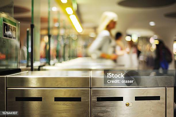 Running Through Subway Gates Stock Photo - Download Image Now - Airport, Crowded, People