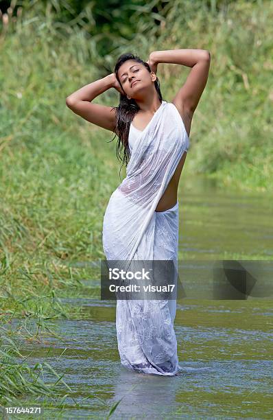 Happy Indian Woman In A White Sari Stock Photo - Download Image Now - Culture of India, Indian Ethnicity, Seductive Women