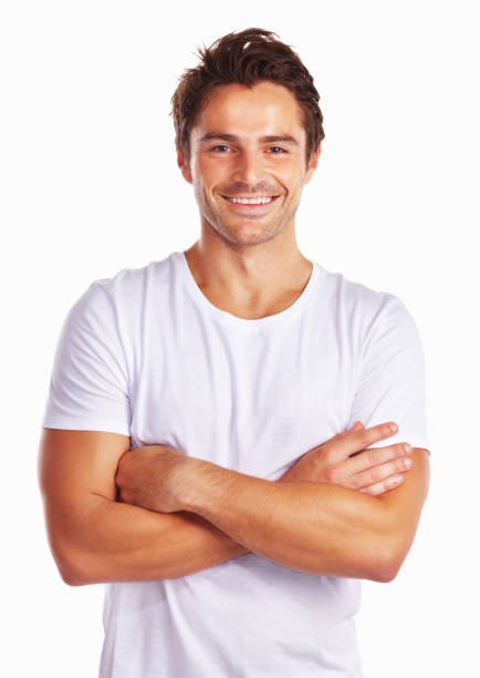 istock Smiling handsome guy with arms crossed against white 157644310