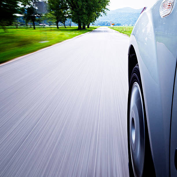 istock Motion blurred car drive on asphalt road 157644321