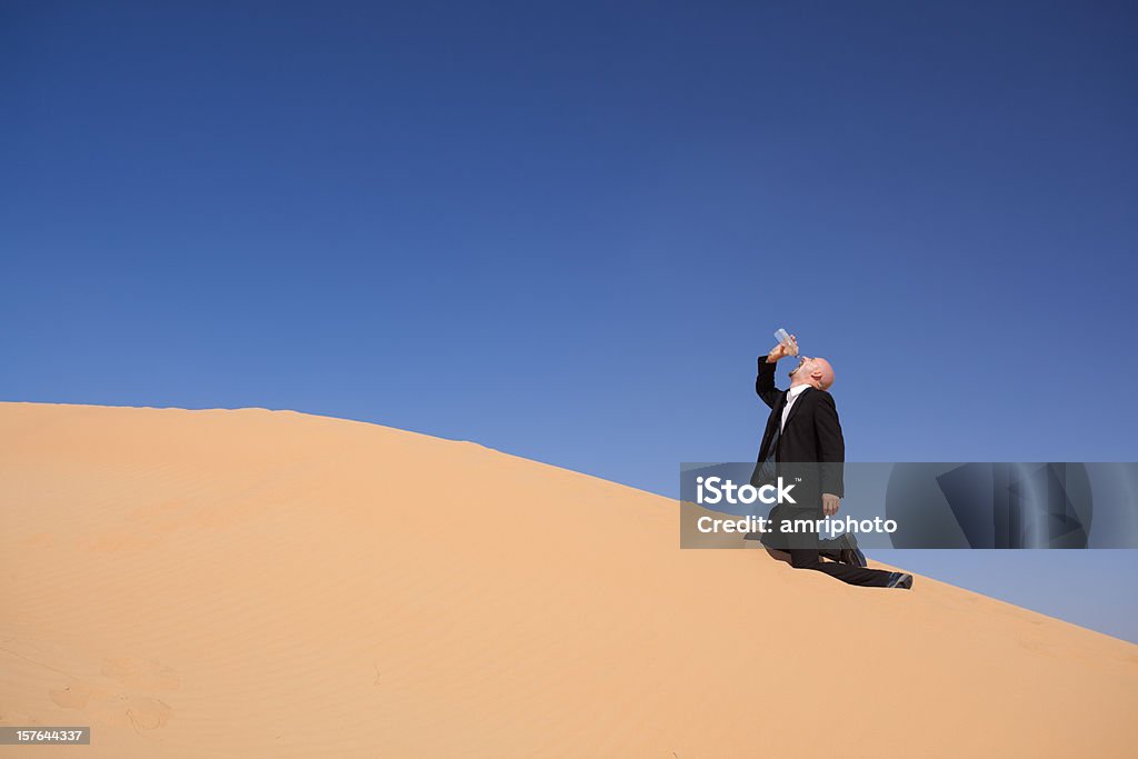 Sete uomo nel deserto - Foto stock royalty-free di Acqua