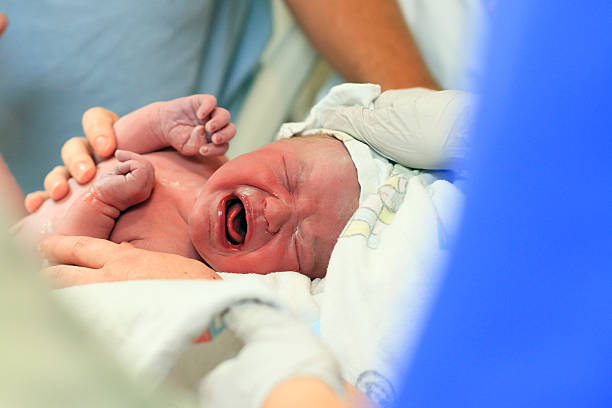 istock Crying Newborn After Childbirth 157644522