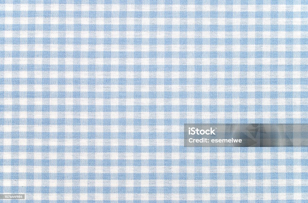 Blue-and-white checkered gingham fabric  Tablecloth Stock Photo