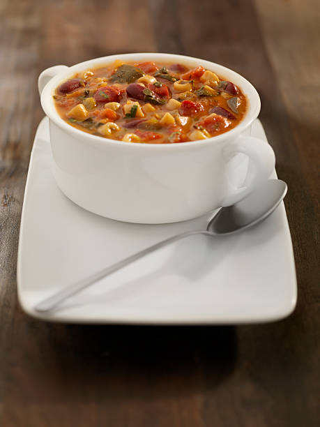 Minestrone Soup  cooked selective focus vertical pasta stock pictures, royalty-free photos & images
