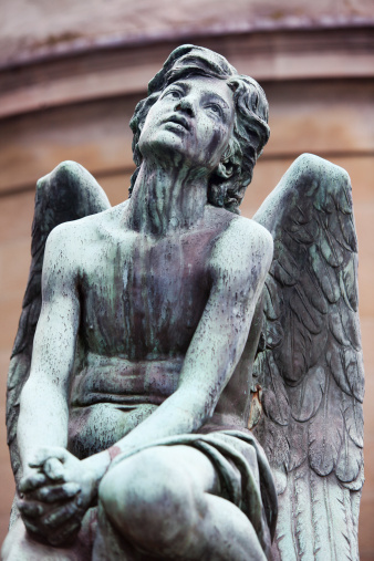 Bronze Angel on Old Tomb in Italy