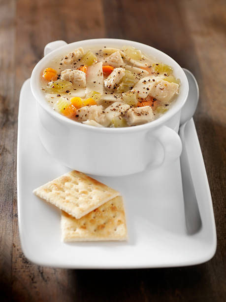istock Chunky Chicken Noodle Soup with Saltine Crackers 157645524