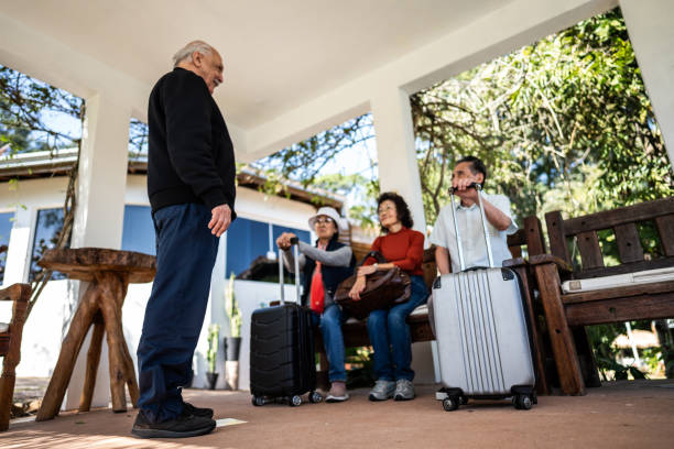 istock Senior friends talking at a hotel 1576456999